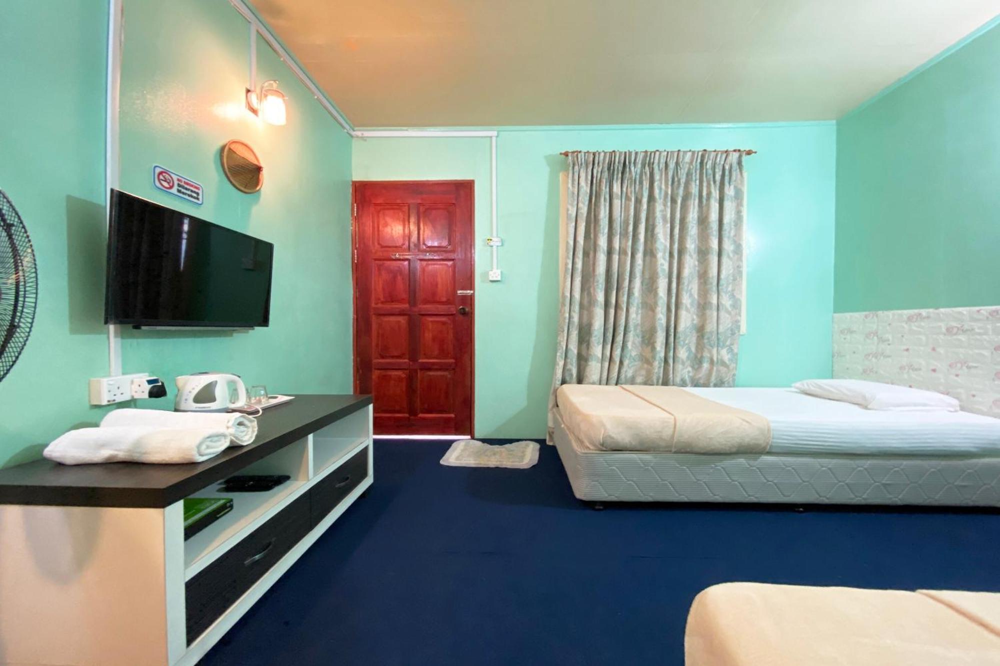 Oyo Home 90285 Pogimpaan Homestay Ranau Eksteriør bilde